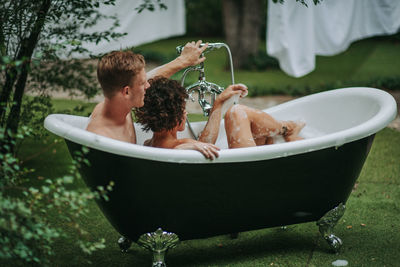 Man and woman in bathtub