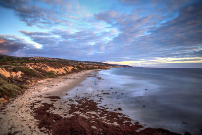 Scenic view of sea against sky at sunset