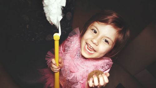 Close-up portrait of smiling girl
