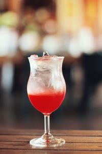 Close-up of wineglass on table