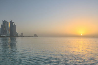 Scenic view of sea against sky during sunset