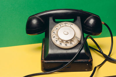 High angle view of telephone on table