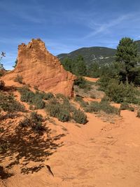 Scenic view of rocky mountains against sky