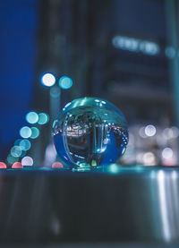 Close-up of illuminated crystal ball