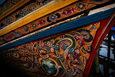 Low angle view of carvings on wall of building