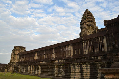 Low angle view of old building against sky