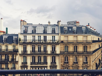 Buildings in city against sky