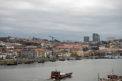 Boats in sea against sky