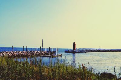 Scenic view of sea against clear sky