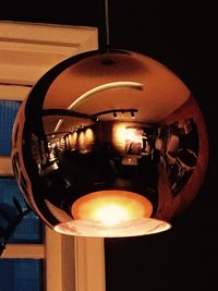 Low angle view of illuminated pendant light