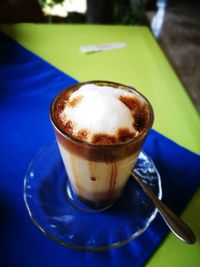 Close-up of cappuccino on table