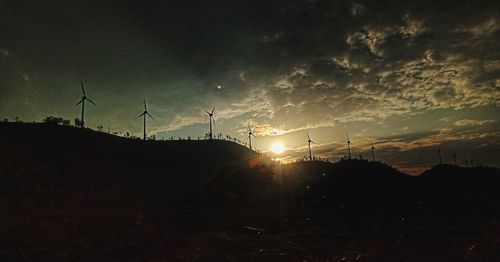 Scenic view of landscape against sky during sunset