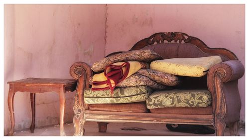 Close-up of chairs at home