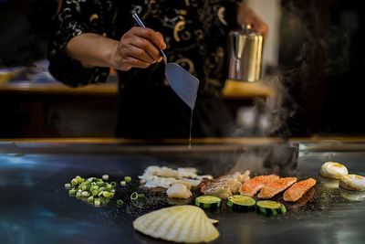 Man preparing food in kitchen