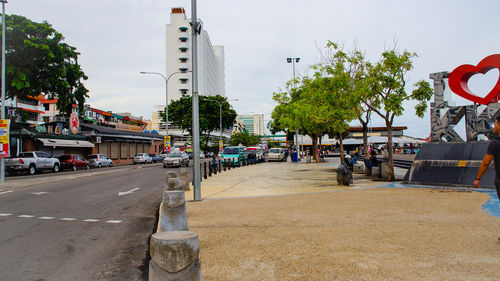 View of city street against sky