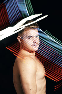 Portrait of a shirtless man
