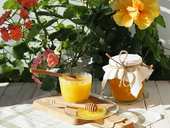 Close-up of yellow rose on table