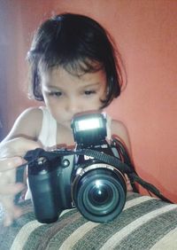 Portrait of boy photographing