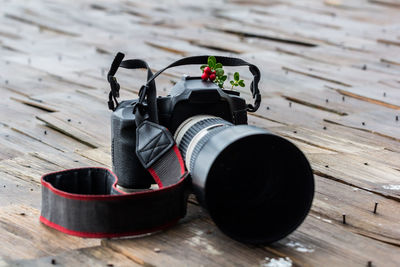 Close-up of camera on table