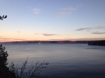 Scenic view of sea against sky at sunset