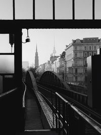 View of bridge over river in city