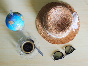 High angle view of coffee cups on table