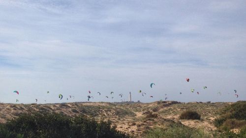 Scenic view of landscape against cloudy sky