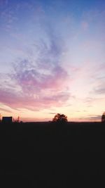 Silhouette landscape against sky during sunset