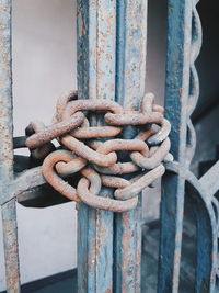 Close-up of rusty tied up of metal chain