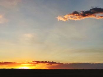 Scenic view of dramatic sky during sunset