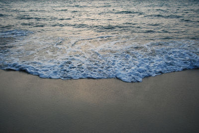 High angle view of waves on beach