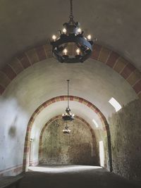 Illuminated light hanging from ceiling