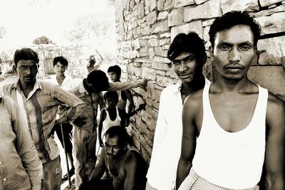 Portrait of men standing outdoors