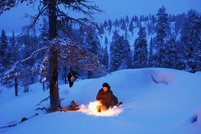 Woman on snow covered field