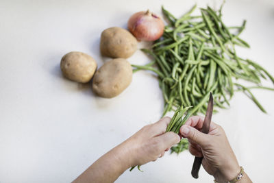 High angle view of person preparing food