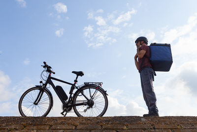 E-bike delivery person prepared for work