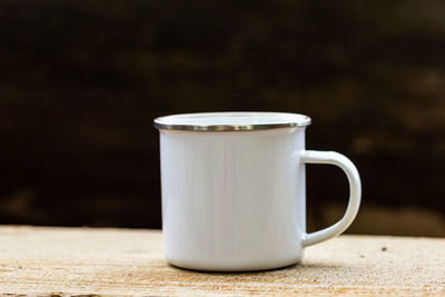 Close-up of coffee cup on table