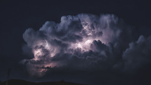 Low angle view of lightning at night