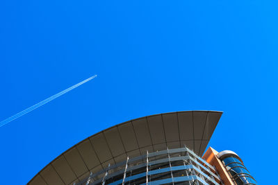 Low angle view of building against blue sky