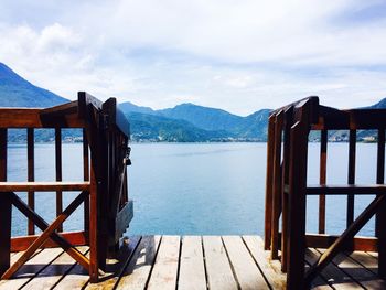 Scenic view of sea with mountains in background