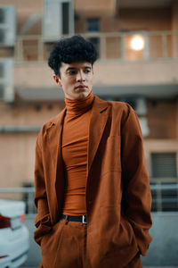 Portrait of young woman looking away