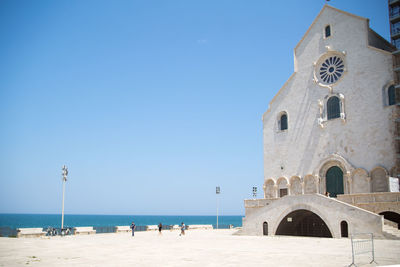 Panoramic view of beach against blue sky