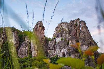 Panoramic view of rock formations against sky