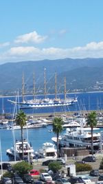 High angle view of sailboats in bay