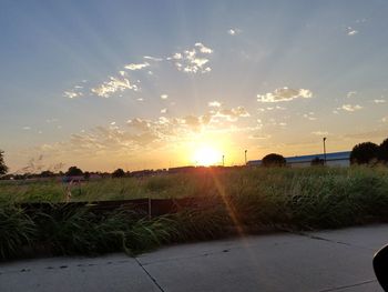 Scenic view of landscape against sky during sunset