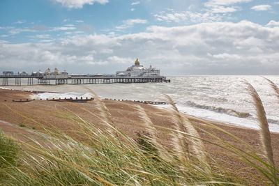 Scenic view of sea against cloudy sky
