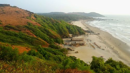 Scenic view of beach against clear sky