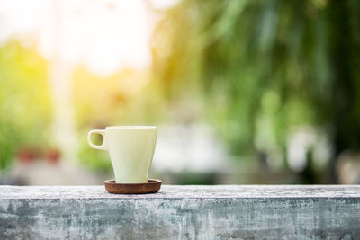 Close-up of coffee cup on table