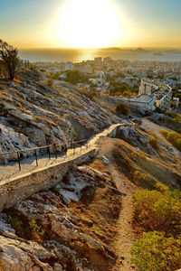 Aerial view of landscape against sky during sunset