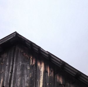 Low angle view of old building against clear sky